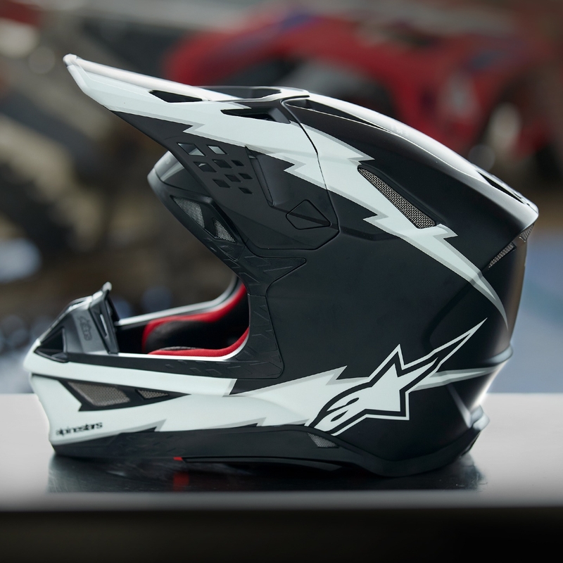 Casco da motocross Alpinestars Supertech S-M10 Ampress nero opaco e bianco