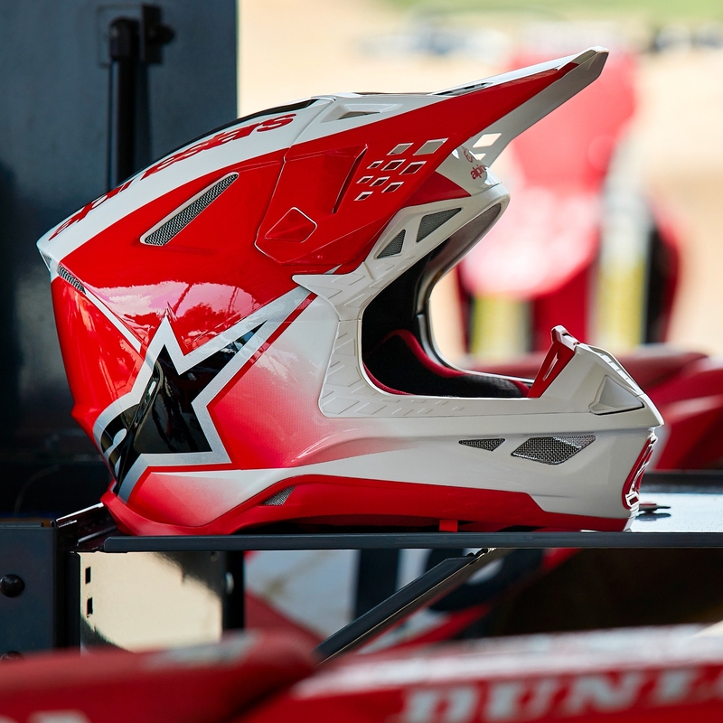 Casco da motocross Alpinestars Supertech S-M10 Unite rosso e bianco