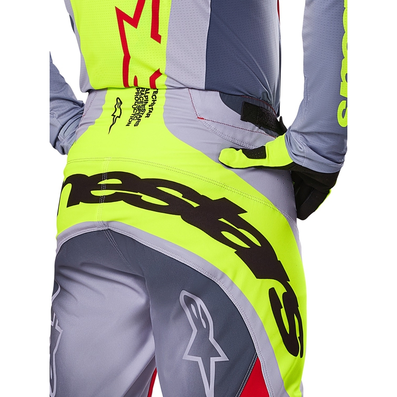 Alpinestars Techstar Melt Pantaloni da motocross rosso e grigio