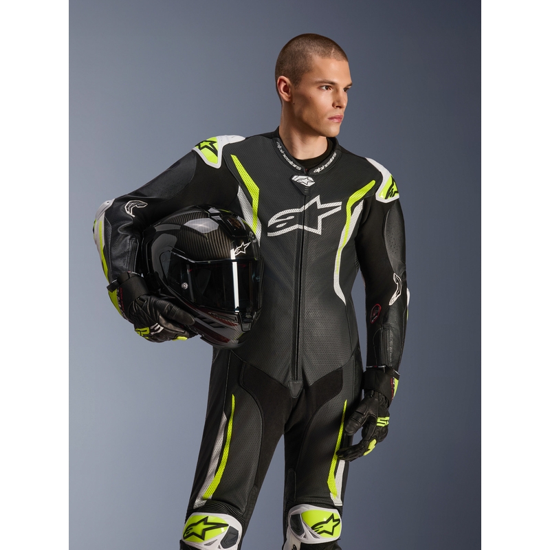 Tuta da moto intera in pelle Alpinestars GP TECH V5, nera, bianca e giallo fluo.