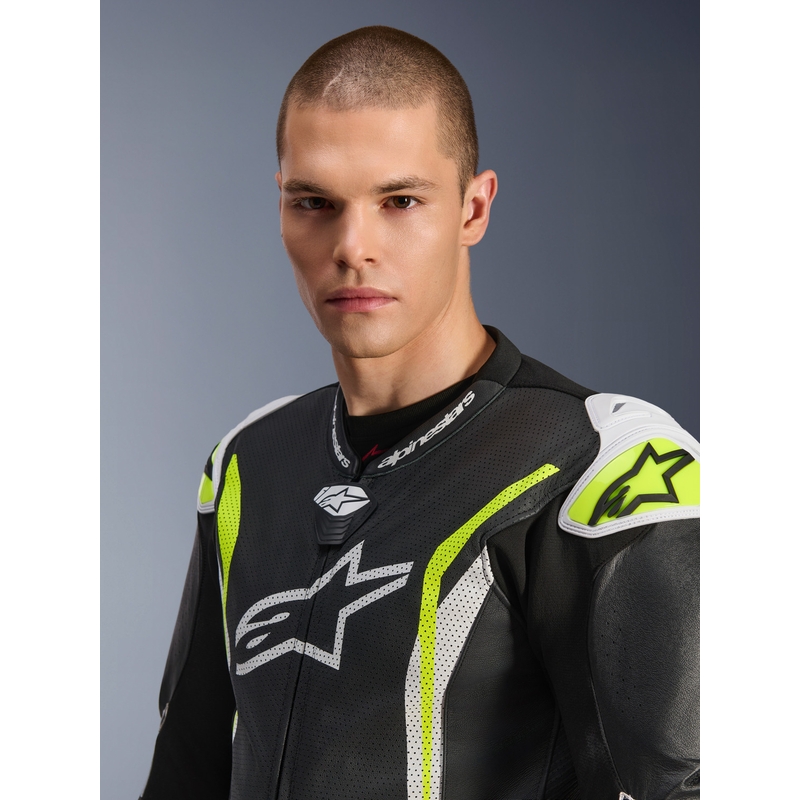 Tuta da moto intera in pelle Alpinestars GP TECH V5, nera, bianca e giallo fluo.