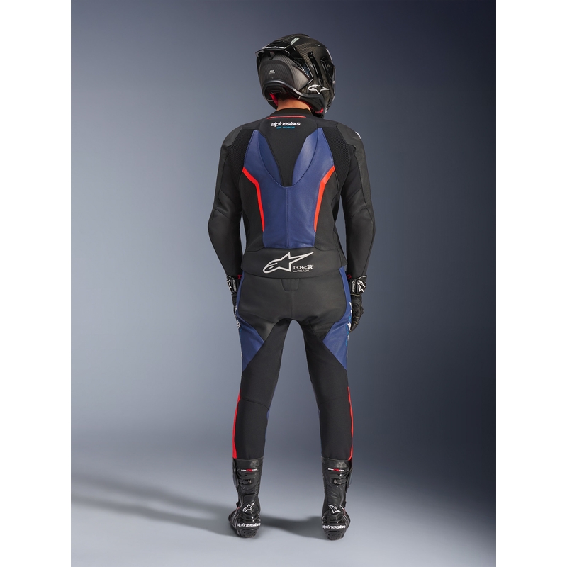 Tuta da moto Alpinestars GP Force V2 a due pezzi, nera, blu e rosso fluo.