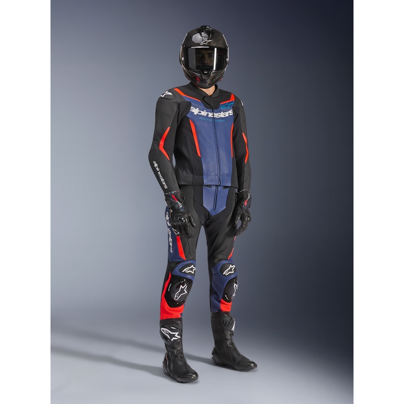 Tuta da moto Alpinestars GP Force V2 a due pezzi, nera, blu e rosso fluo.