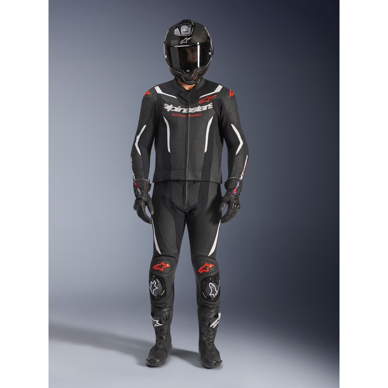 Tuta in pelle Alpinestars GP Force V2 a due pezzi, nera, bianca e rosso fluo.
