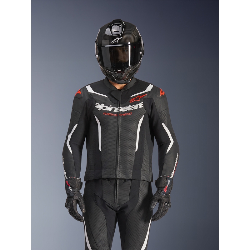Tuta in pelle Alpinestars GP Force V2 a due pezzi, nera, bianca e rosso fluo.
