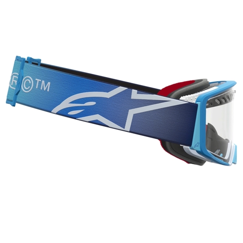 Occhiali da motocross Alpinestars Supertech Dura Air Fluid blu-argento con lente in plexiglass trasparente.