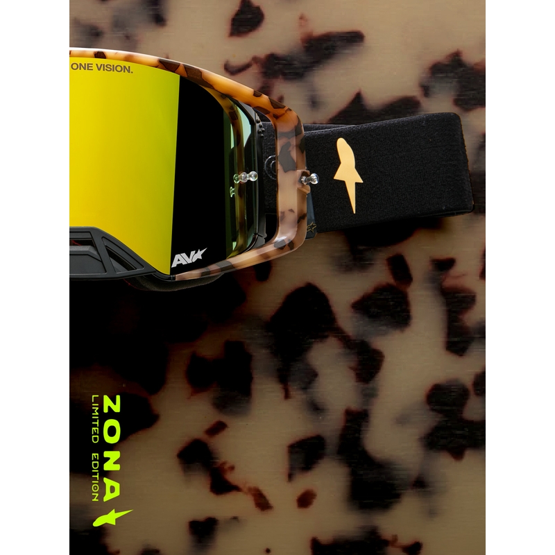 Occhiali da motocross Alpinestars Supertech Zona edizione limitata, neri e marroni con plexiglass a specchio color oro.